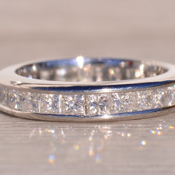 Jewelry - Designer Signed Platinum and Natural Diamond Channel Set Band